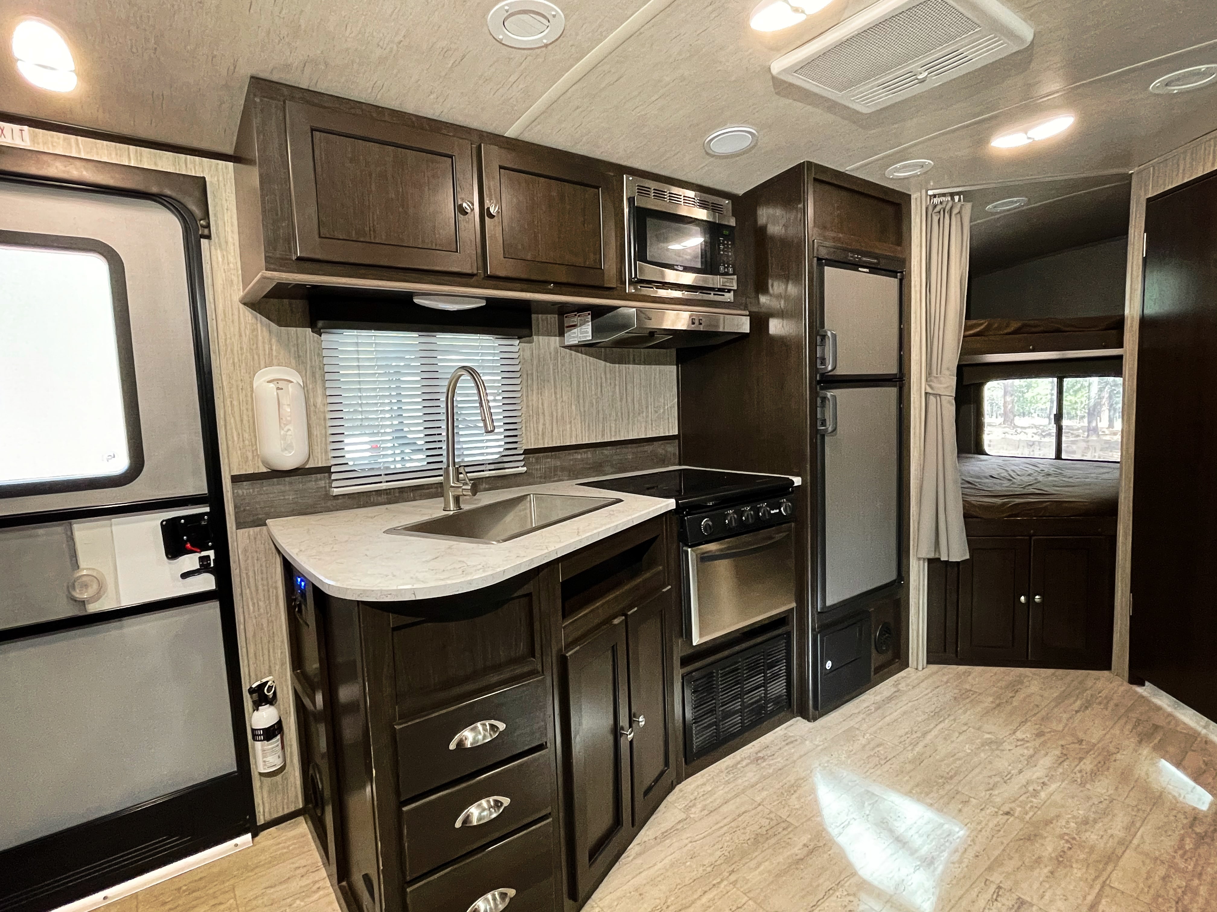 travel trailer with master bedroom slide and bunkhouse